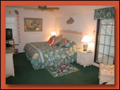 The master bedroom is on the second floor and offers a king size bed.