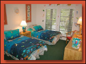 The first floor has one bedroom with two twin beds.